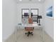 Bright home office with a white desk, comfortable chair, and modern decor at 6727 N 9Th Dr, Phoenix, AZ 85013