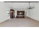 Spacious open-concept kitchen with dark wood cabinets, granite countertops, and stainless steel appliances at 6727 N 9Th Dr, Phoenix, AZ 85013