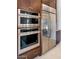 Gourmet kitchen featuring stainless steel appliances and custom wood cabinetry for a modern look at 6727 N 9Th Dr, Phoenix, AZ 85013