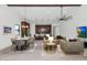 Open floor plan with great room leading into the modern kitchen, perfect for entertaining at 6727 N 9Th Dr, Phoenix, AZ 85013