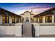 Elegant courtyard entry with a fountain and Spanish-style architecture at 6860 E Gray Fox Ct, Gold Canyon, AZ 85118