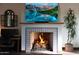 Fireplace with a tiled surround and built-in media console at 6860 E Gray Fox Ct, Gold Canyon, AZ 85118