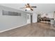 Open living area with kitchen island and wood-look flooring at 6931 E Diamond St, Scottsdale, AZ 85257