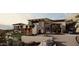 Modern home with stone and wood exterior and mountain views at 7256 N 40Th St # 6, Paradise Valley, AZ 85253