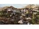 Contemporary home with stone exterior, infinity pool, and mountain views at 7256 N 40Th St # 6, Paradise Valley, AZ 85253