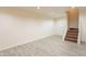 Unfinished basement with tile floors and stairs at 8446 N 34Th Dr, Phoenix, AZ 85051