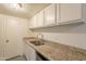Kitchen with granite countertops and double sink at 8446 N 34Th Dr, Phoenix, AZ 85051