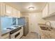 Kitchen features granite counters and stainless steel appliances at 8446 N 34Th Dr, Phoenix, AZ 85051