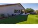 Artificial turf lawn and covered patio at 8836 W Midway Ave, Glendale, AZ 85305