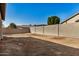 Large backyard with block wall and unlandscaped space at 10036 W Parkway Rd, Tolleson, AZ 85353