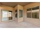 Covered patio with sliding glass door access at 10036 W Parkway Rd, Tolleson, AZ 85353