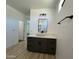 Modern bathroom with gray vanity and white vessel sink at 11615 S 211Th Ln, Buckeye, AZ 85326