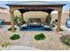 Backyard featuring gazebo with comfortable seating and landscaped pavers at 1233 E Redfield Rd, Phoenix, AZ 85022