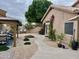 Well-maintained backyard features landscaped garden, a gazebo, and a charming walkway at 1233 E Redfield Rd, Phoenix, AZ 85022