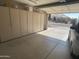 Two-car garage with built-in cabinets and ample storage space at 14226 W Via Montoya --, Sun City West, AZ 85375