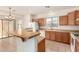 Spacious kitchen with island and ample cabinetry at 14400 N 136Th Ln, Surprise, AZ 85379