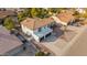 Two-story home with three-car garage and desert landscaping at 15806 N 45Th Pl, Phoenix, AZ 85032