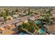 Aerial view showcasing house, pool, and surrounding neighborhood at 15806 N 45Th Pl, Phoenix, AZ 85032