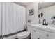 Clean bathroom with white vanity, shower, and toilet at 15806 N 45Th Pl, Phoenix, AZ 85032