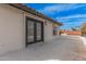 Private rooftop deck with double doors and partial view at 15806 N 45Th Pl, Phoenix, AZ 85032