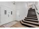 Entryway with double doors and staircase at 15806 N 45Th Pl, Phoenix, AZ 85032