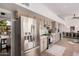 Modern kitchen with stainless steel appliances and light taupe cabinets at 15806 N 45Th Pl, Phoenix, AZ 85032