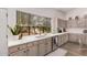 Modern kitchen with stainless steel appliances and white countertops at 15806 N 45Th Pl, Phoenix, AZ 85032