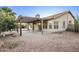 Backyard with pergola, patio, and gravel landscaping at 169 S Comanche Dr, Chandler, AZ 85224