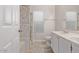 Bathroom with double vanity, shower and tub at 169 S Comanche Dr, Chandler, AZ 85224