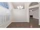 Spacious dining area with wood flooring and a chandelier at 169 S Comanche Dr, Chandler, AZ 85224