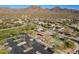 Aerial view of community with homes, park, playground, and basketball court at 17353 N 99Th St, Scottsdale, AZ 85255