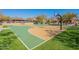 Well-maintained basketball court with green and tan surfaces at 17353 N 99Th St, Scottsdale, AZ 85255