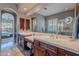 Double vanity bathroom with large mirror and separate shower at 17353 N 99Th St, Scottsdale, AZ 85255