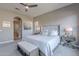 Bright bedroom with comfy bed and sitting area at 17353 N 99Th St, Scottsdale, AZ 85255