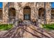 Building entrance with stone steps and arched entryway at 17353 N 99Th St, Scottsdale, AZ 85255