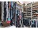 Large walk-in closet with ample hanging and shelving space at 17353 N 99Th St, Scottsdale, AZ 85255