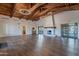 Large community room with hardwood floors and fireplace at 17353 N 99Th St, Scottsdale, AZ 85255