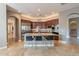 Spacious kitchen with granite island and stainless steel appliances at 17353 N 99Th St, Scottsdale, AZ 85255