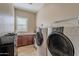 Convenient laundry room with washer and dryer hookups at 17353 N 99Th St, Scottsdale, AZ 85255