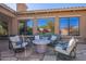 Inviting patio with fire pit and comfortable seating at 17353 N 99Th St, Scottsdale, AZ 85255