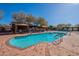 Community pool with surrounding cabanas at 17353 N 99Th St, Scottsdale, AZ 85255