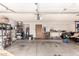 Large garage with shelving and storage at 17463 N 63Rd Dr, Glendale, AZ 85308