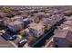 Aerial view of a suburban neighborhood with tile roofs, solar panels, and desert landscaping at 17749 W Woodrow Ln, Surprise, AZ 85388