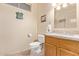 Clean bathroom with granite vanity and updated fixtures at 17802 N Bridle Ln, Surprise, AZ 85374