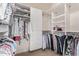 Walk-in closet with ample shelving and hanging space at 17802 N Bridle Ln, Surprise, AZ 85374