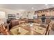 Bright dining area with wood table and kitchen views at 17802 N Bridle Ln, Surprise, AZ 85374