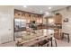 Modern kitchen with granite countertops and island at 17802 N Bridle Ln, Surprise, AZ 85374