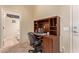 Home office with built-in desk and chair at 17802 N Bridle Ln, Surprise, AZ 85374