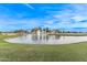 Picturesque pond and fountain in a golf course community at 17802 N Bridle Ln, Surprise, AZ 85374