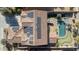 Aerial view showcasing home, pool, and solar panels at 17842 W Chuckwalla Canyon Rd, Goodyear, AZ 85338